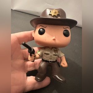 The Walking Dead Rick Grimes
Sheriff 13 Funko Pop Vinyl Figure /
Figure